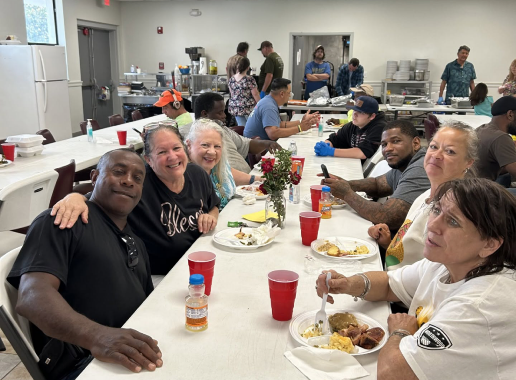 A resident meeting with a Panama City Rescue Mission case manager
