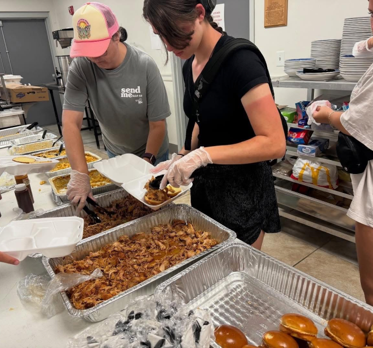 Volunteers preparing community meals